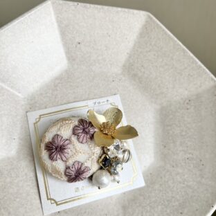button brooch